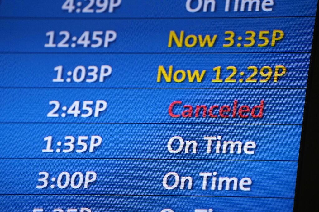 Flight cancellations ease slightly as July 4 weekend ends