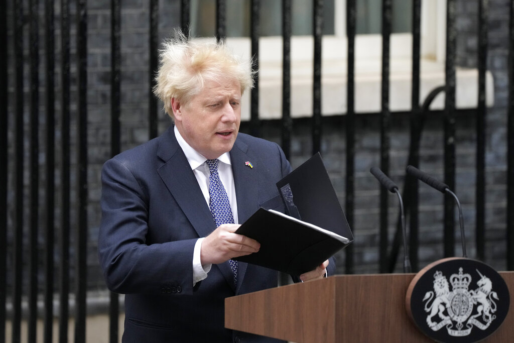 Johnson resigns, remains UK prime minister for now