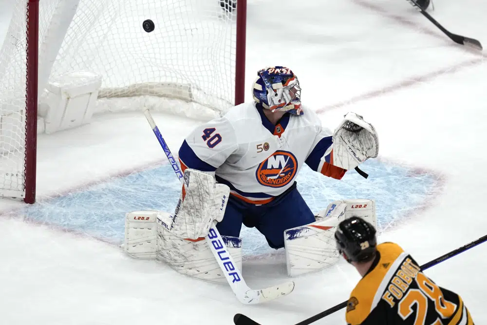 Bruins beat Isles in shootout