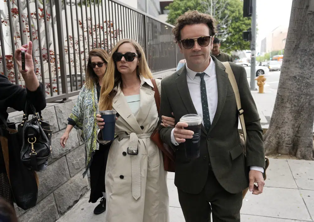 ‘That ‘70s Show’ star Danny Masterson found guilty of 2 rape counts, is led from court in handcuffs