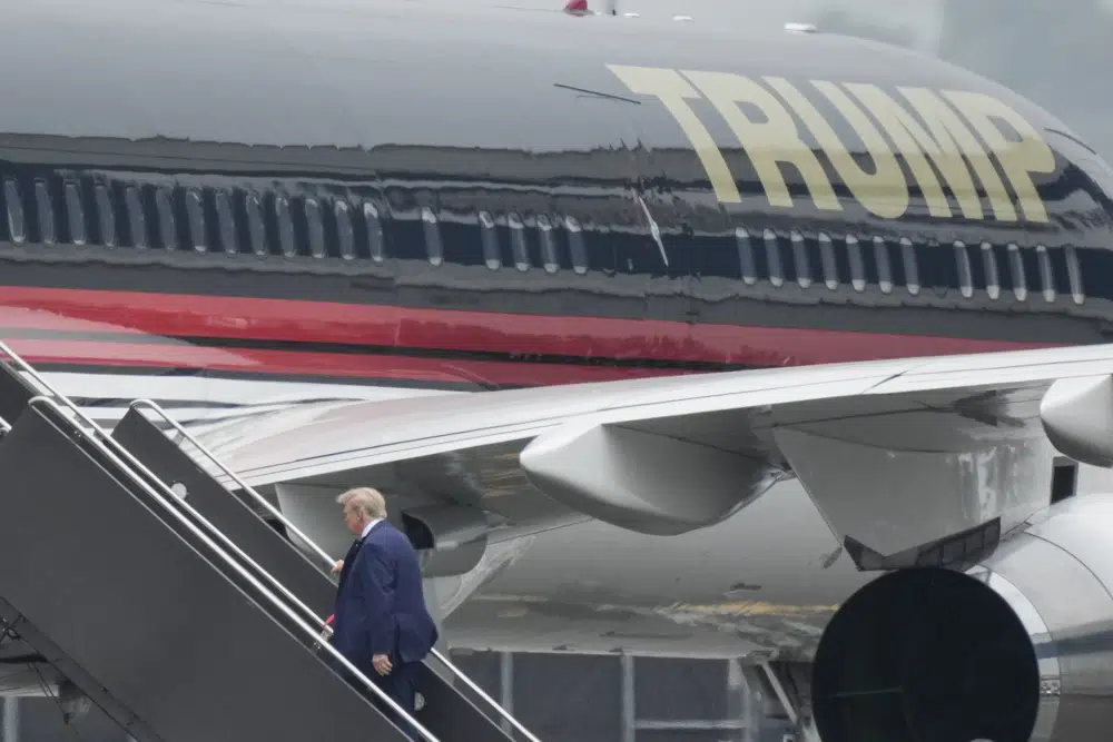 Trump arrives in Florida as history-making court appearance approaches in classified documents case
