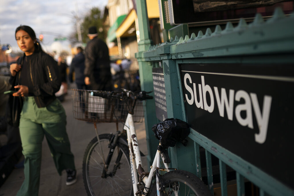 New York City subway train derails in collision with another train, injuring more than 20 people