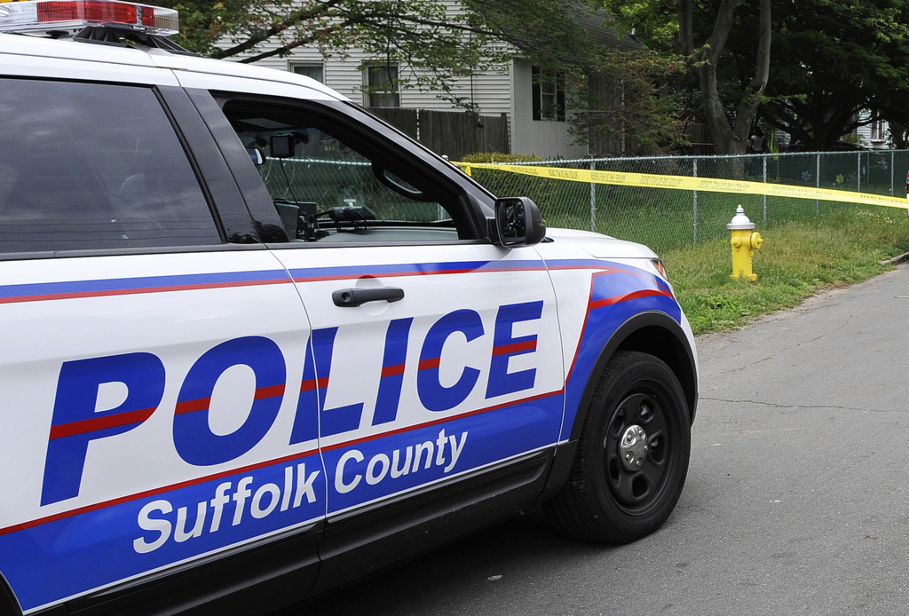 Police officer shot in the face while investigating a killing in suburban New York