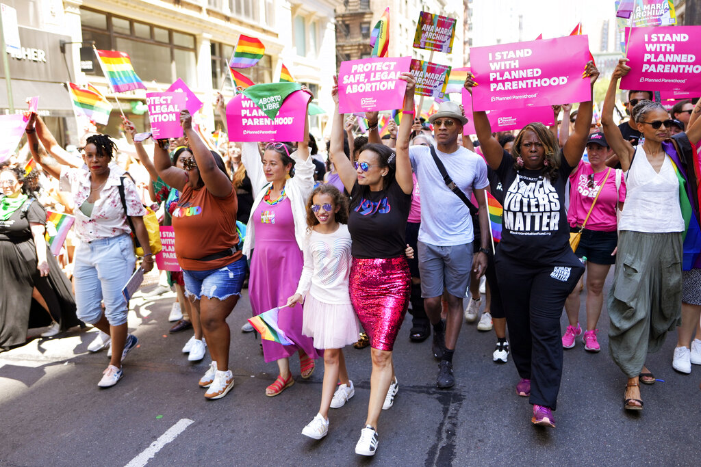 Pride parades march on with new urgency across US