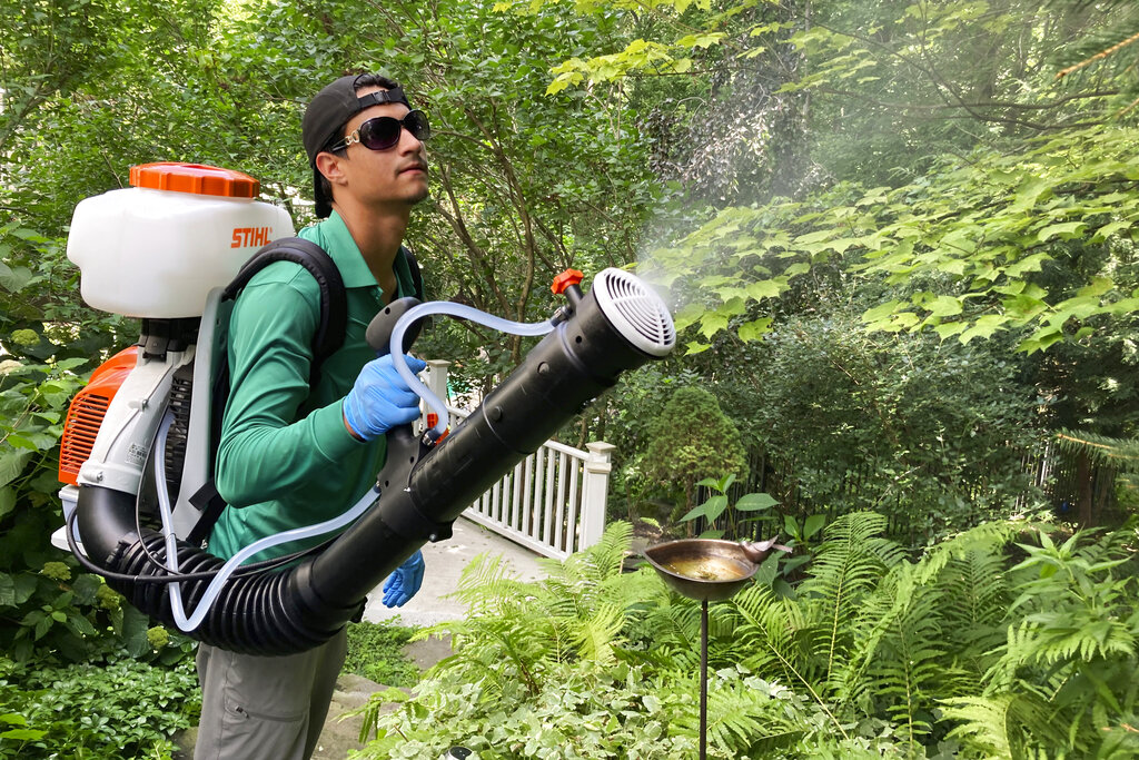 Backyard mosquito spraying booms, but may be too deadly