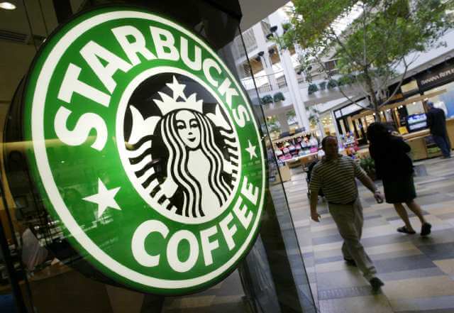 Starbucks to close hundreds of stores, lay off 900 workers as part of turnaround plan