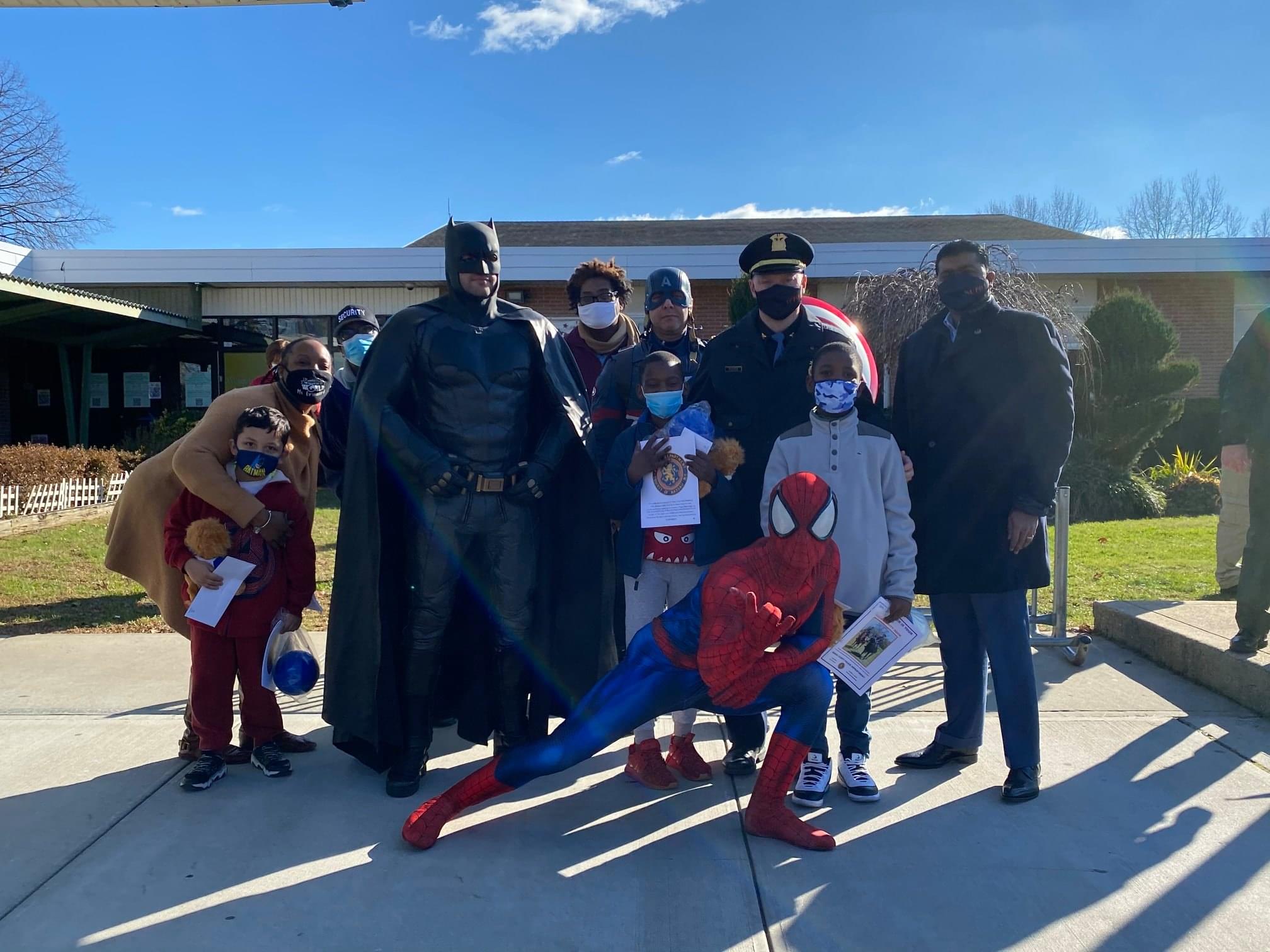 Cops dressed as Superhero’s delivered gifts to Long Island school children