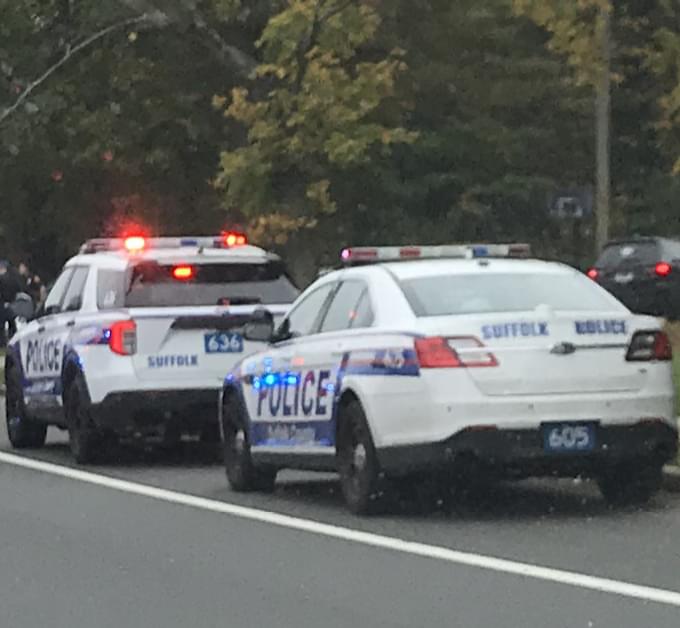 Body camera footage shows Suffolk Cops kicking a suspect