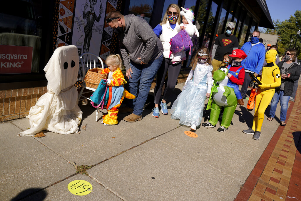 The Latest: Fauci says fine to trick-or-treat this year