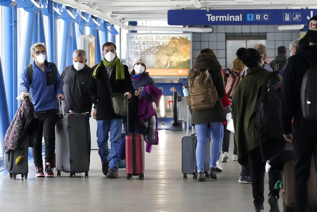 Snow storms and pandemic ground flights, delay holiday’s end