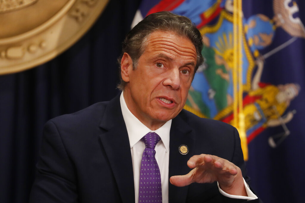 Cuomo files suit against NY ethics board over book profits