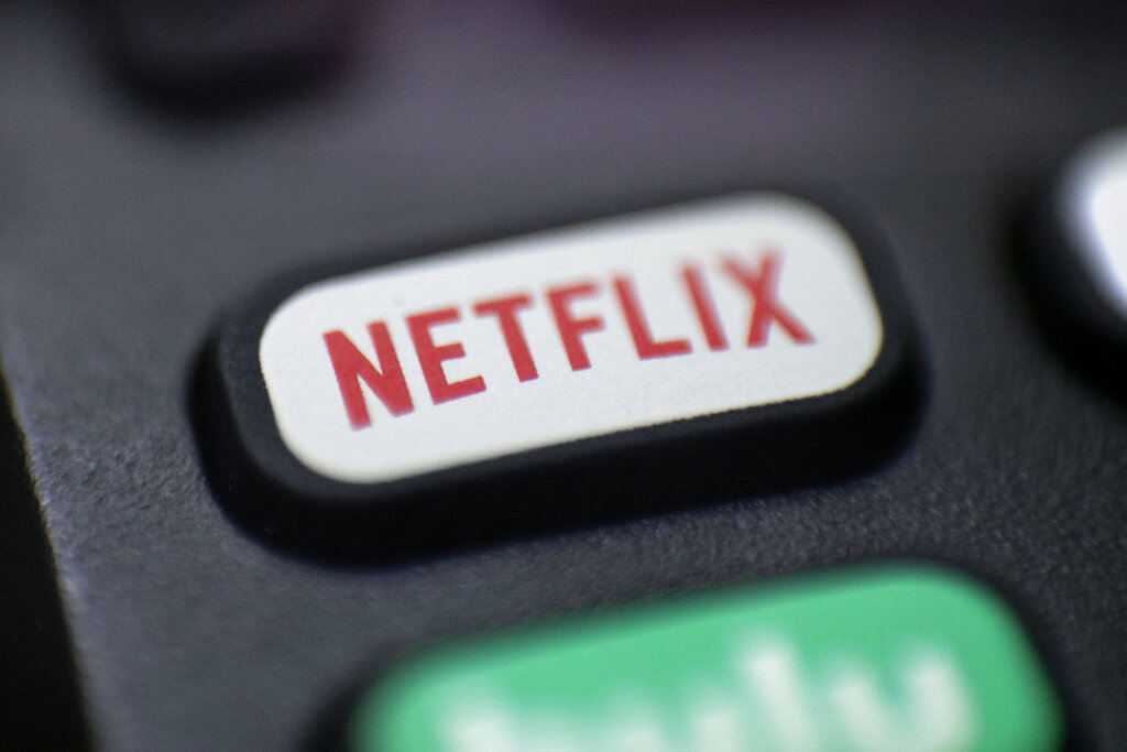 Netflix aims to curtail password sharing – and bring in ads