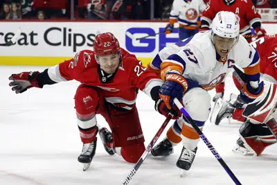 Hurricanes hold on to beat Islanders to open NHL playoffs