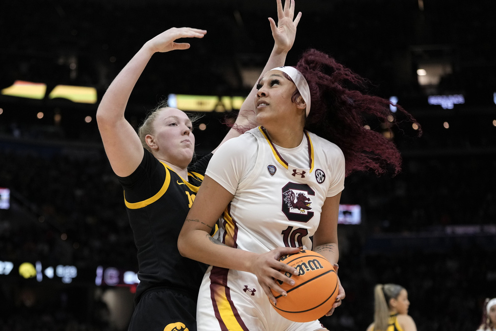 South Carolina finishes perfect season with NCAA championship, beating Iowa 87-75