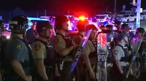 Video: The moment when gunfire suddenly erupted on streets of Ferguson