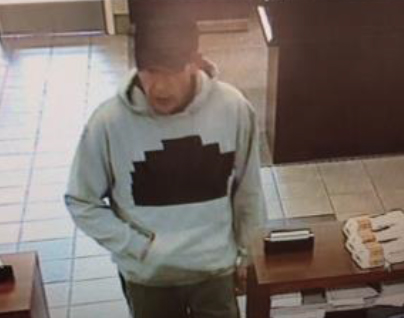 Police looking for man who struck another Troy bank