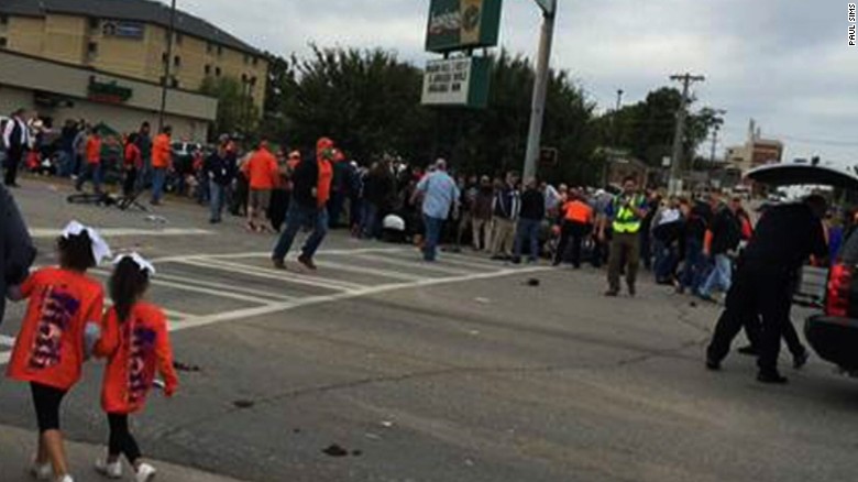 Car runs into crowd at Oklahoma State homecoming parade, killing 3