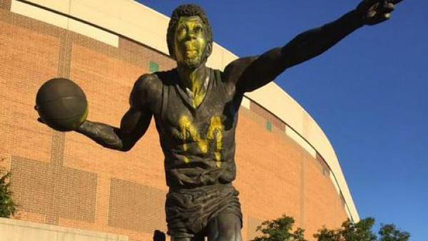 Vandals spray paint Magic Johnson statue