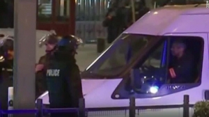 7 detained and 2 dead in Paris suburb raid