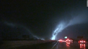 Massive tornado roars across highway