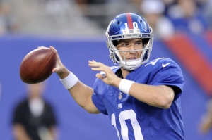 New York Giants quarterback Eli Manning (10) throws a pass during the first half of a preseason NFL football game against the New York Jets Saturday, Aug. 29, 2015 in East Rutherford, N.J. (AP Photo/Bill Kostroun)