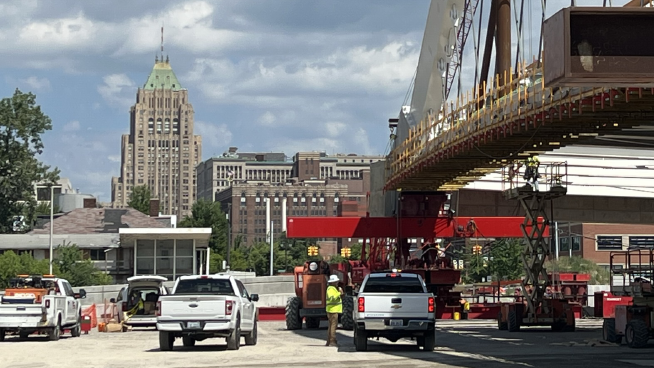 I-94 Remains Closed as Massive Tied Arch Bridge Gets Rolled into Place