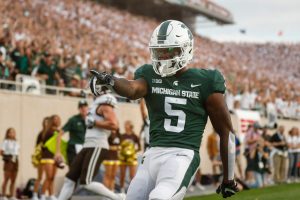 Sep 2, 2022; East Lansing, Michigan, USA; Michigan State wide receiver Germie Bernard (5) scores a touchdown against Western Michigan during the first half at Spartan Stadium in East Lansing on Friday, Sept. 2, 2022. © Junfu Han/USA TODAY NETWORK