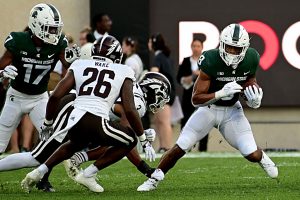 Michigan State Spartans running back Jalen Berger (8) runs with the ball in the first quarter at Spartan Stadium during their game against Western Michigan University. Photo: Dale Young-USA TODAY Sports