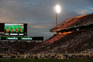 Sunset shines on the northwest end of the Spartan Stadium in East Lansing during the game between Michigan State and Western Michigan on Friday, Sept. 2, 2022. Photo: Junfu Han/Detroit Free Press