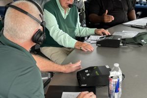Michigan State Football play-by-play broadcasters George Blaha and Jason Strayhorn talk with 760 WJR’s Steve Courtney. Photo: Curtis Paul / WJR