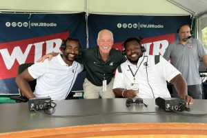 Playfly Sports General Manager Otis Wiley, Michigan State University Pre and Post Game Commentator Jehuu Caulcrick, and 760 WJR’s Steve Courtney. Photo: Curtis Paul/WJR