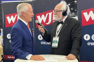 September 16, 2022 ~ Penske President and Chevrolet Detroit Grand Prix Chairman Bud Denker speaks with 760 WJR’s Paul W. Smith live from the North American International Detroit Auto Show Charity Preview. Photo: Jonah Phillips