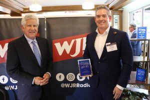 September 27, 2022 ~ Stifel Vice President of Investments Jon Randal stands with 760 WJR's Guy Gordon at the 2022 Rising Stars honoree reception. Photo: Sean Boeberitz / 760 WJR