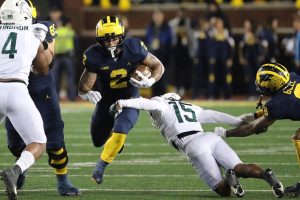 October 29, 2022 ~ Michigan running back Blake Corum is tackled by Michigan State safety Angelo Grose during the first half of the Michigan / Michigan State game in Ann Arbor. Photo: Kirthmon F. Dozier / USA TODAY NETWORK