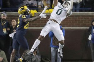 October 29, 2022 ~ Michigan State wide receiver Keon Coleman catches a touchdown pass against Michigan defensive back Gemon Green during the first half of the Michigan / Michigan State game in Ann Arbor. Photo: Kirthmon F. Dozier-USA TODAY Sports