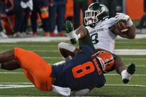 November 5, 2022 ~ Illinois Fighting Illini linebacker Tarique Barnes brings down Michigan State Spartans running back Jalen Berger during the second half at Memorial Stadium. Photo: Ron Johnson-USA TODAY Sports