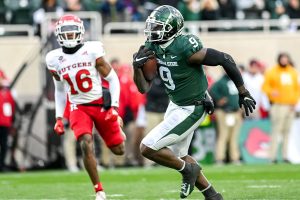 November 12, 2022 ~ Michigan State's Daniel Barker runs for a touchdown after a catch against Rutgers during the first quarter at Spartans Stadium. Photo: Nick King/Lansing State Journal / USA TODAY NETWORK