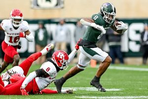 November 12, 2022 ~ Michigan State's Jalen Berger breaks tackle attempts vs. Rutgers on a run during the third quarter at Spartans Stadium. Photo: Nick King/Lansing State Journal / USA TODAY NETWORK