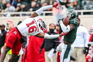 November 12, 2022 ~ Michigan State's Jayden Reed catches a pass as Rutgers' Max Melton defends during the second quarter at Spartans Stadium. Photo: Nick King/Lansing State Journal / USA TODAY NETWORK