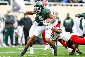 November 12, 2022 ~ Michigan State's Jalen Berger runs for a gain against Rutgers during the fourth quarter at Spartans Stadium. Photo: Nick King/Lansing State Journal / USA TODAY NETWORK