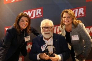 November 19, 2022 ~ The Capital Grille Sales and Marketing Manager Lisa Banish, Soaring Eagle Casino & Resort Properties CEO Melinda Coffin, and 760 WJR’s Paul W. Smith at the 2022 Women Who Lead Honoree Ceremony inside Joe Muer Seafood in Detroit’s Renaissance Center. Photo: Sean Boeberitz / WJR