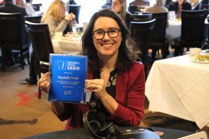 November 19, 2022 ~ Make Food Not Waste Founder and Executive Director Danielle Todd displays her award at the 2022 Women Who Lead Honoree Ceremony inside Joe Muer Seafood in Detroit’s Renaissance Center. Photo: Sean Boeberitz / WJR