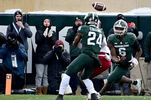 November 19, 2022 ~ The football bounces off Michigan State Spartans running back Elijah Collins and into the hands of tight end Maliq Carr in the end zone for a touchdown against the Indiana Hoosiers at Spartan Stadium. Photo: Dale Young-USA TODAY Sports