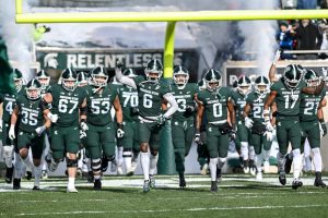 November 19, 2022 ~ Michigan State takes the field before the game against Indiana at Spartan Stadium. Photo: Nick King / Lansing State Journal