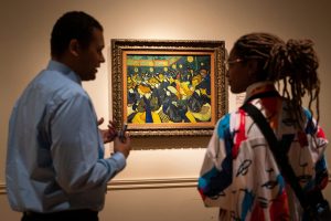 September 29, 2022 ~ Travis Fletcher, 33, left, talks with his colleague Robyn Banks, 22, both of Detroit, during a media preview day for the new "Van Gogh in America" exhibit at the Detroit Institute of Arts in Detroit. Photo: Sarahbeth Maney / USA TODAY NETWORK