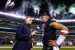 January 8, 2023 ~ Television analyst Evan Washburn talks with Philadelphia Eagles quarterback Jalen Hurts after a victory against the New York Giants at Lincoln Financial Field. Photo: Bill Streicher ~ USA TODAY Sports