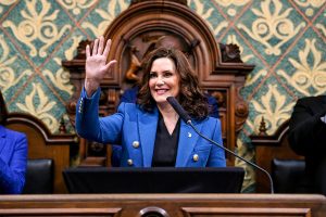 January 25, 2023 ~ Gov. Gretchen Whitmer waves to the crowd during her State of The State address at the Michigan State Capitol in Lansing. Photo: Nick King / USA TODAY NETWORK