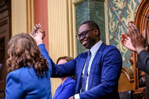 January 25, 2023 ~ Governor Gretchen Whitmer shakes hands with Lutenant Governor Garlin Gilchrist before her State of The State address at the Michigan State Capitol in Lansing. Nick King / USA TODAY NETWORK