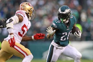 January 29, 2023 ~ Philadelphia Eagles running back Miles Sanders carries the football against San Francisco 49ers linebacker Dre Greenlaw during the second quarter in the NFC Championship game at Lincoln Financial Field. Photo: Bill Streicher ~ USA TODAY Sports