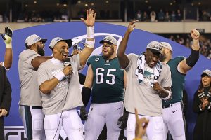 January 29, 2023 ~ Philadelphia Eagles quarterback Jalen Hurts celebrates with offensive tackle Lane Johnson and wide receiver A.J. Brown during the NFC Championship trophy presentation after win against the San Francisco 49ers in the NFC Championship game at Lincoln Financial Field. Photo: Bill Streicher ~ USA TODAY Sports